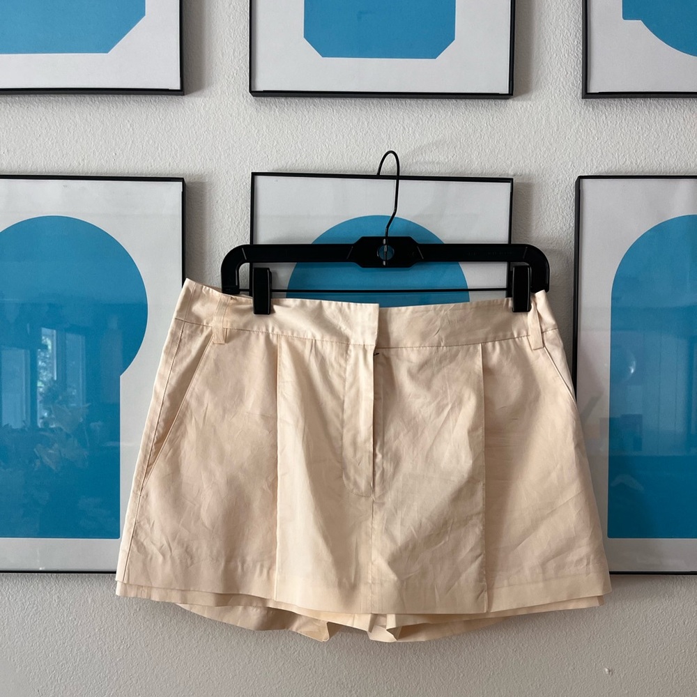 Tibi eco-poplin double front mini skirt.